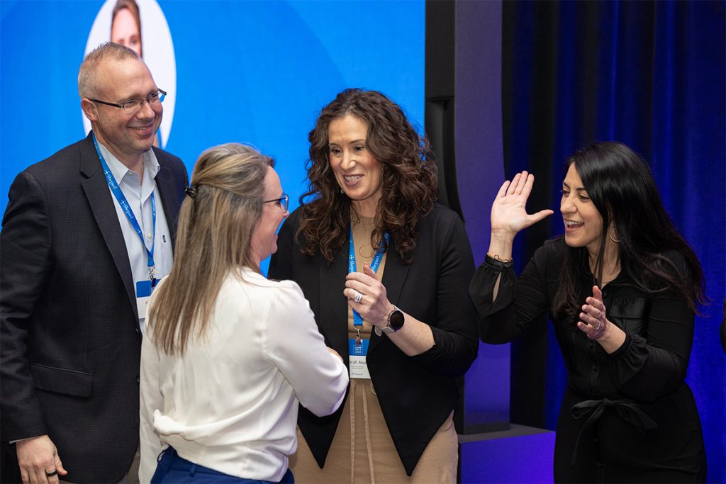 Shepard colleagues congratulating each other